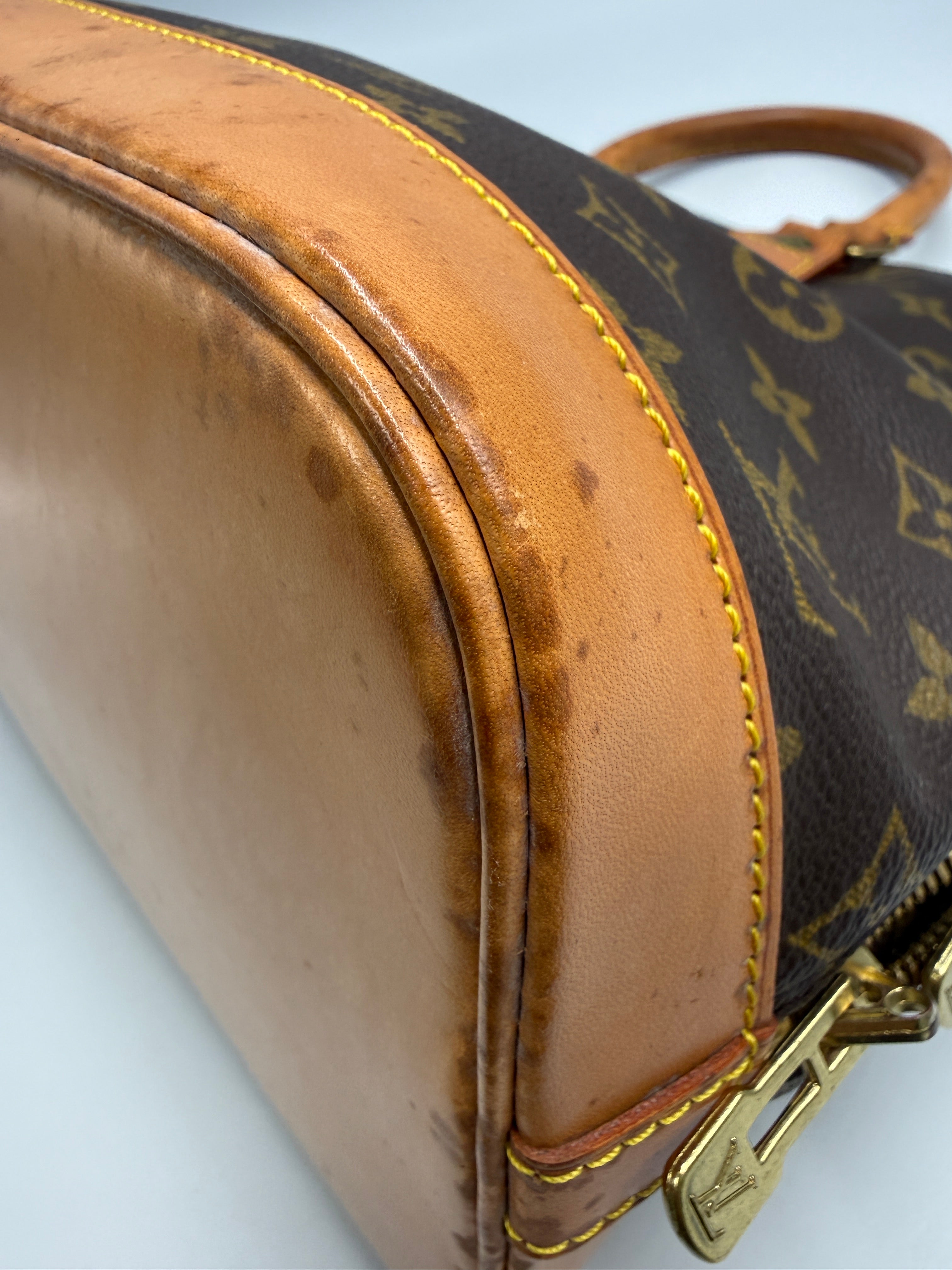 Louis Vuitton Alma MM Monogram Canvas Satchel Bag
