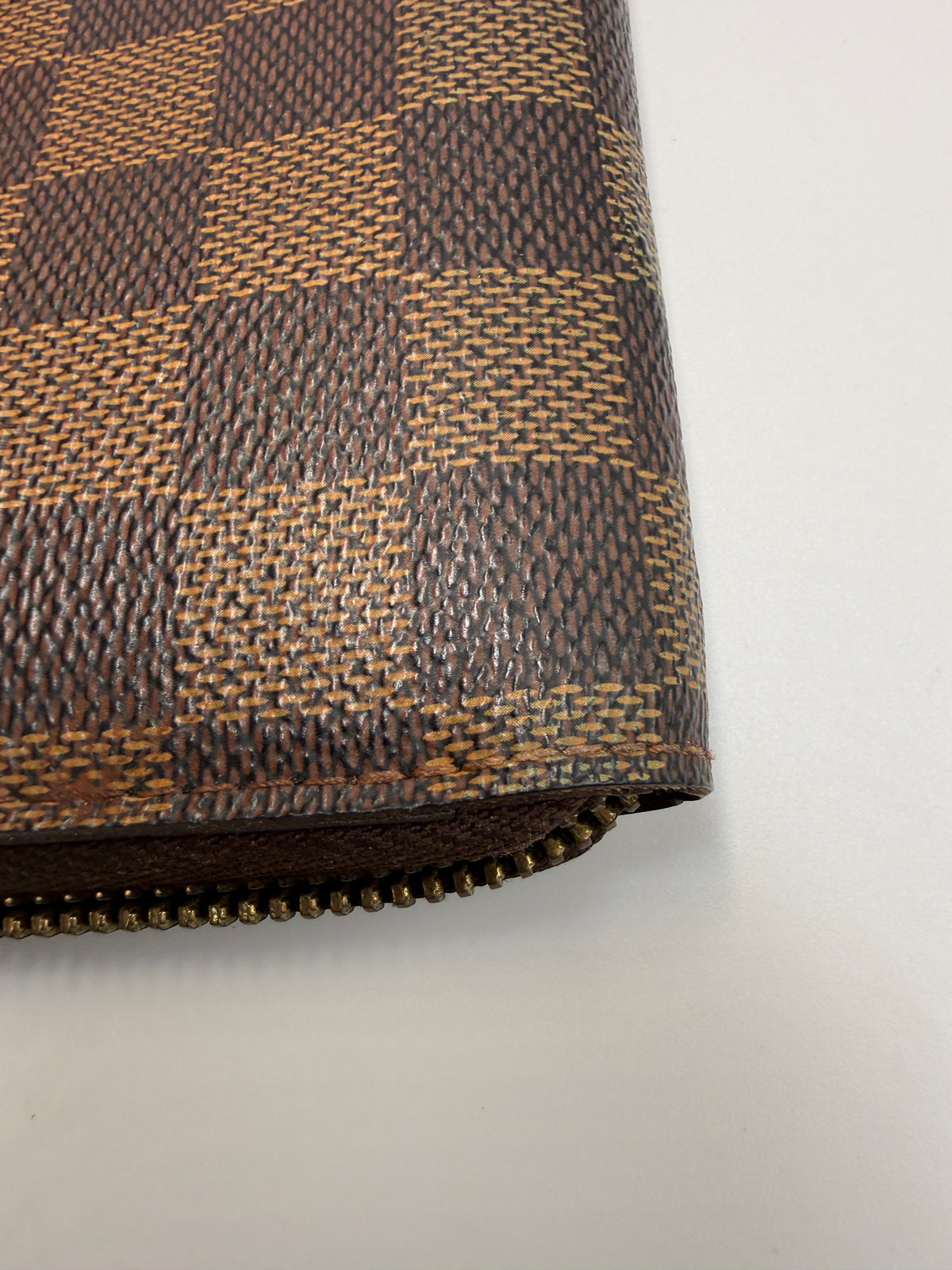Louis Vuitton Zippy Wallet in Damier Ebene Canvas