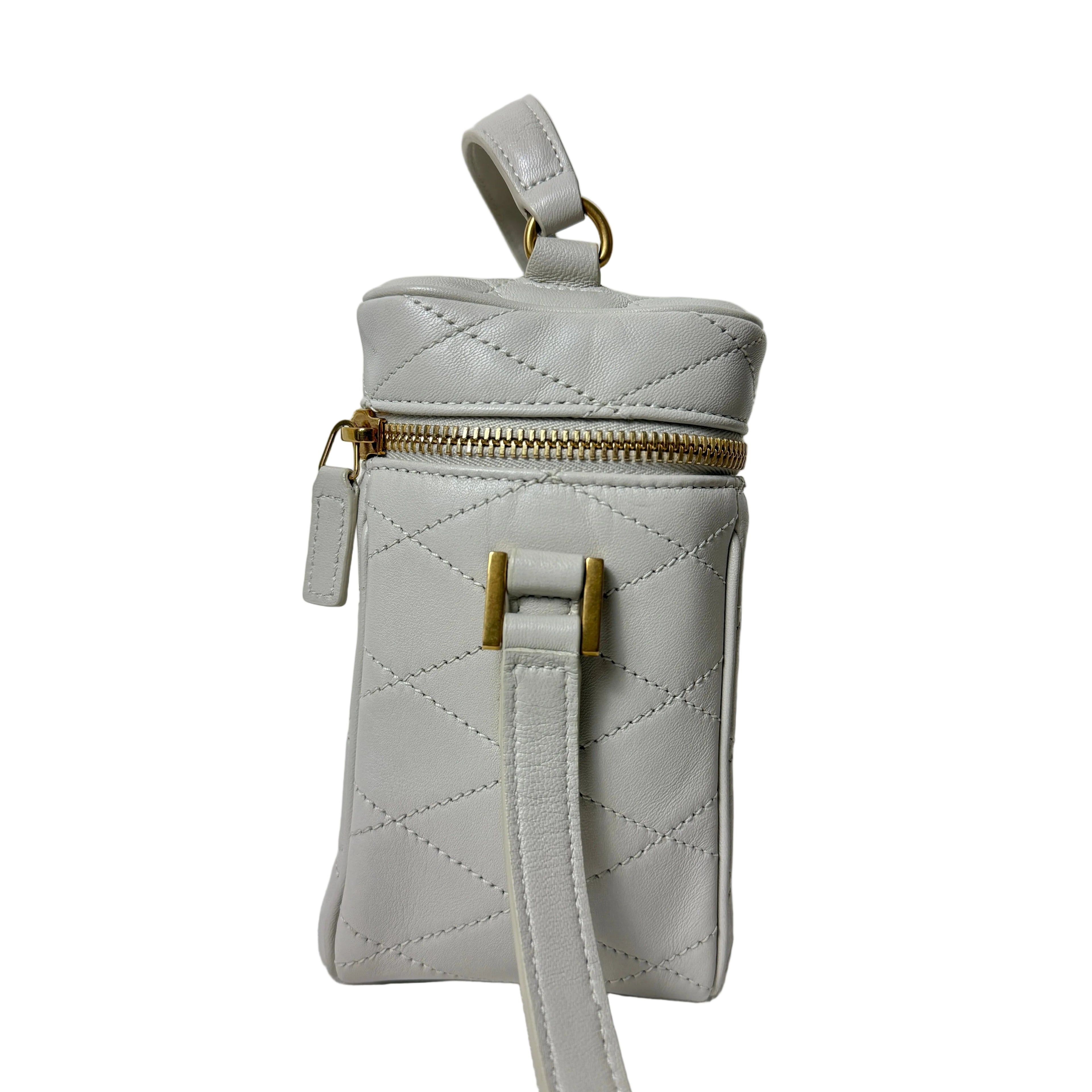 Light gray saint laurent quilted handbag with gold chain strap 