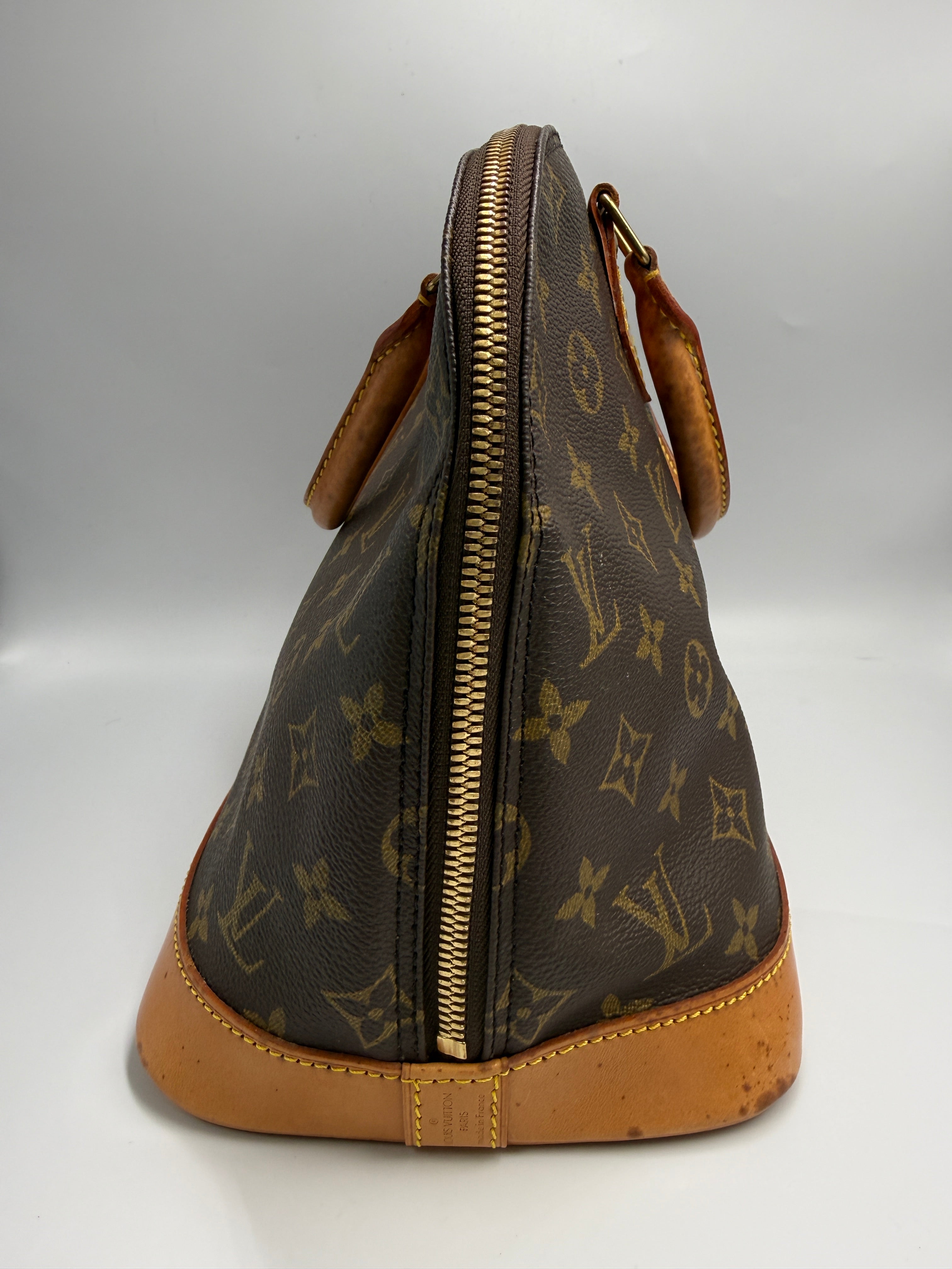 Louis Vuitton Alma MM Monogram Canvas Satchel Bag