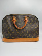 Louis Vuitton Alma MM Monogram Canvas Satchel Bag