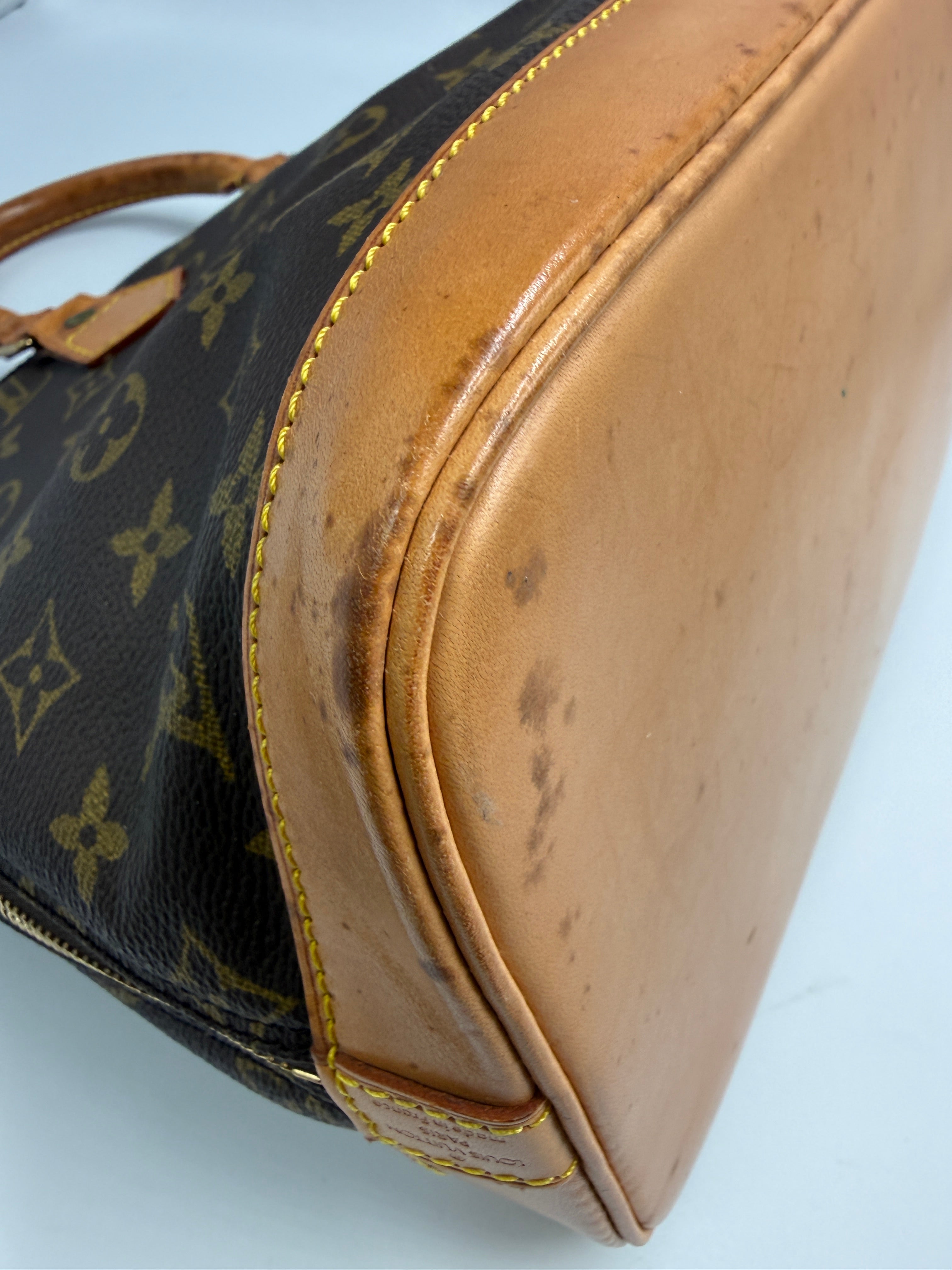 Louis Vuitton Alma MM Monogram Canvas Satchel Bag