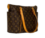 Louis Vuitton monogram canvas shoulder bag with tan leather handles and trim, shown on a white background.