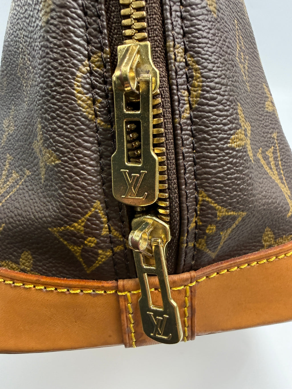 Louis Vuitton Alma MM Monogram Canvas Satchel Bag