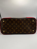 Louis Vuitton Flandrin Bag in Monogram Canvas and Red Calfskin