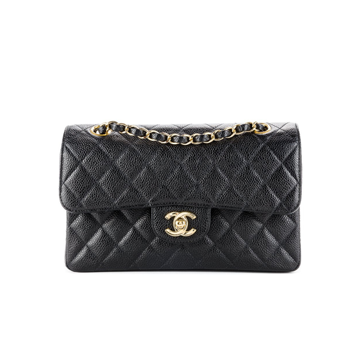 Black quilted handbag with gold chain and clasp on a white background