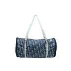 Blue duffel bag with white strap on a white background