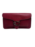 Authentic pre-owned Coach Tabby Shoulder Bag 26 in berry pink leather featuring tortoise shell and brass C hardware with dual straps.