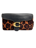 Authentic pre-owned Coach Tabby Shoulder Bag 26 in leopard print calf hair and black leather with antique brass C hardware and dual straps.