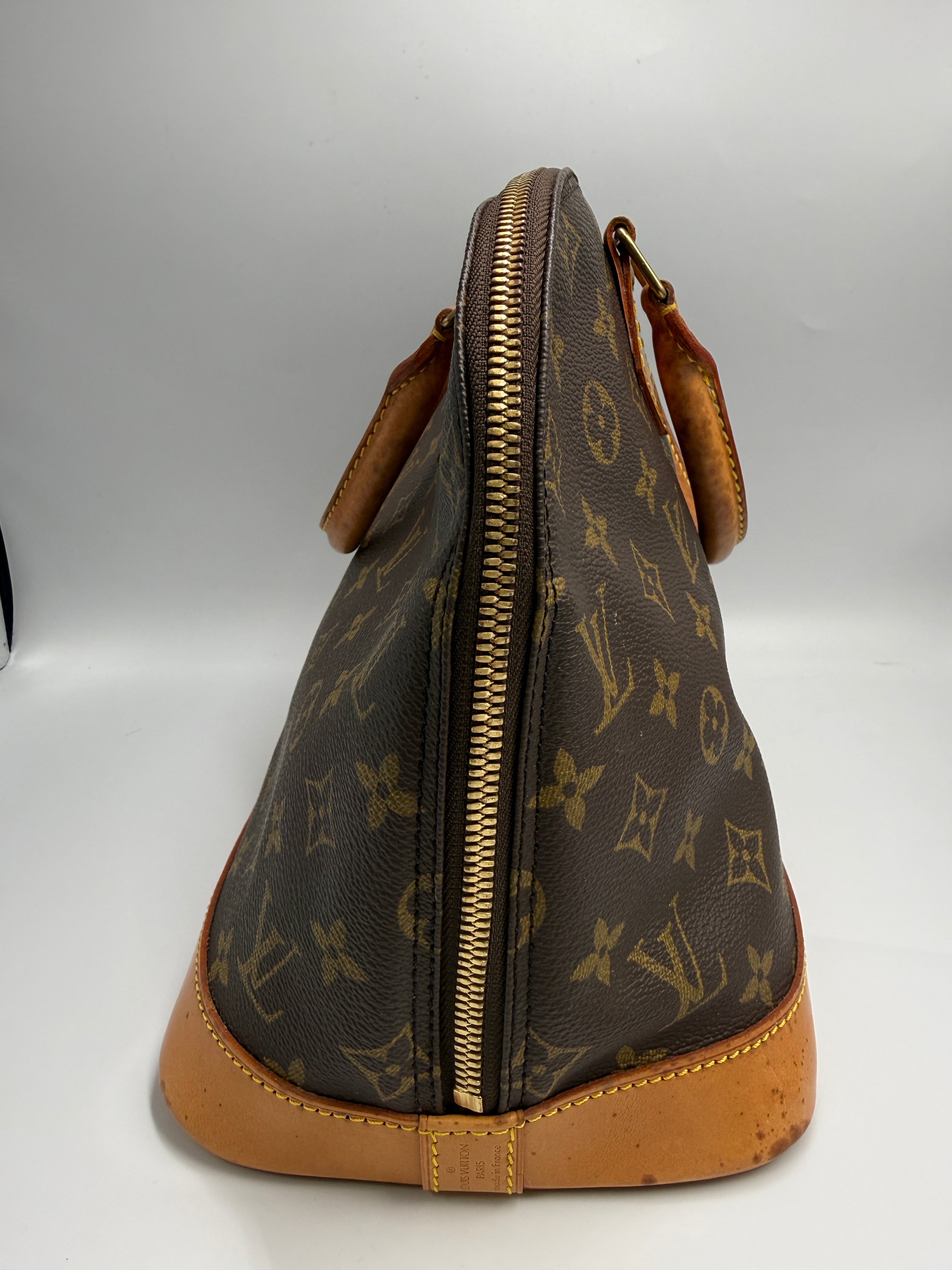 Louis Vuitton Alma MM Monogram Canvas Satchel Bag