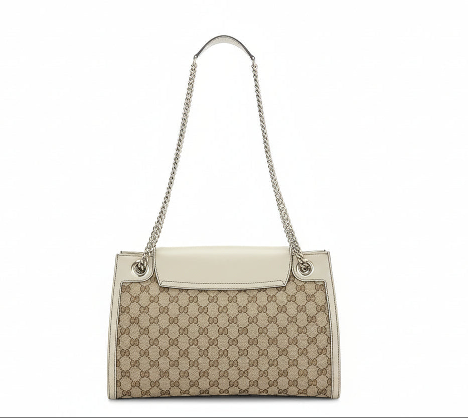 the back view of pre-owned Gucci Beige gg canvas with white leather and silver chain shoulder strap in very good condition 