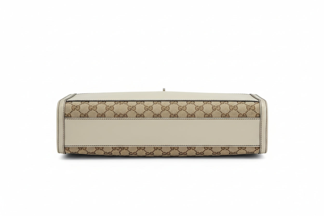 pre-loved gucci canvas with gg logo print  n Beige handbag with a patterned design