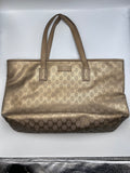 Gucci GG Monogram metallic gold coated canvas tote bag with shoulder straps