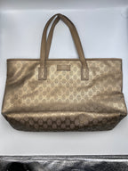 Gucci GG Monogram metallic gold coated canvas tote bag with shoulder straps