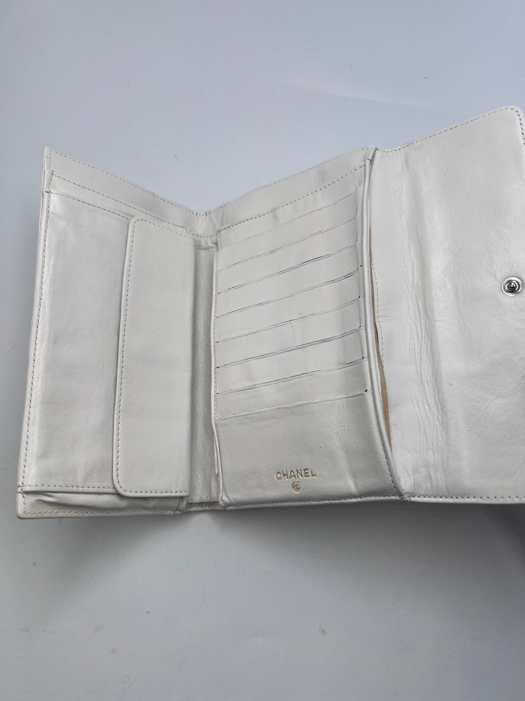Chanel Icon Embossed White Lambskin Flap Long Wallet