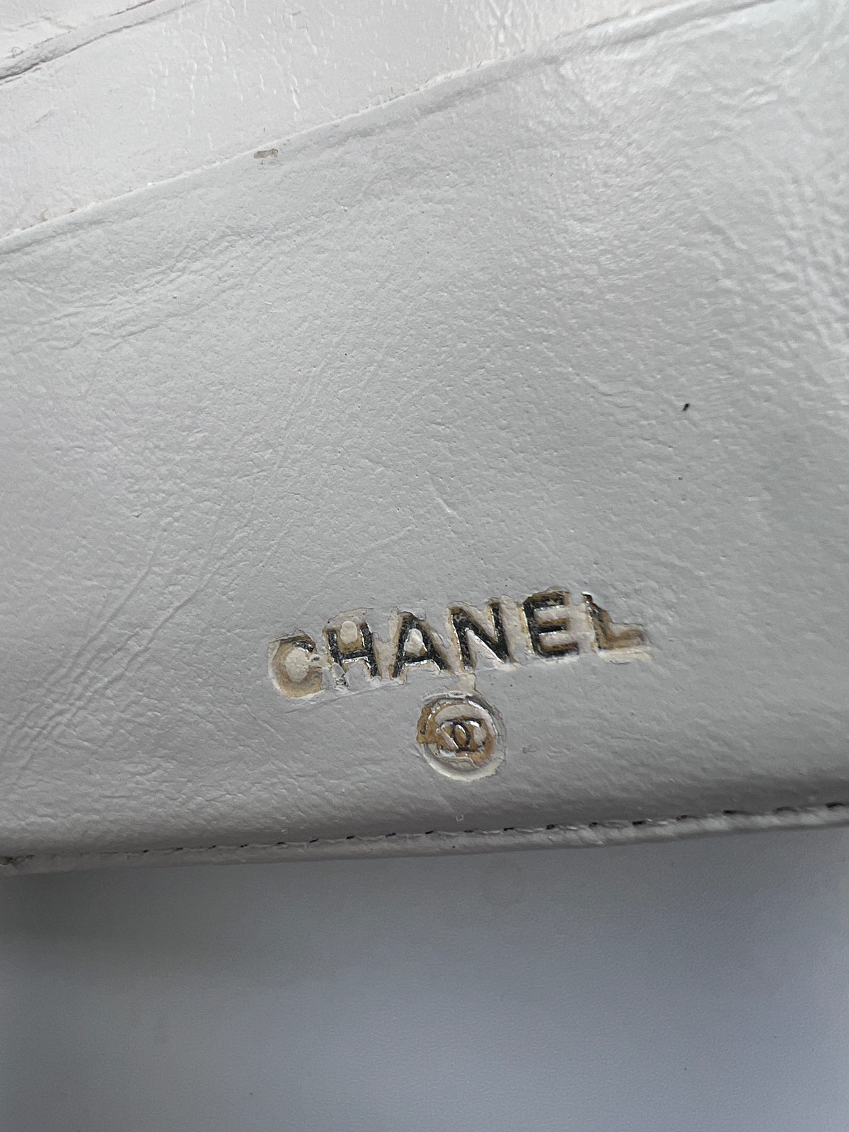 Chanel Icon Embossed White Lambskin Flap Long Wallet