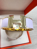 Hermès Clic Clac H Bracelet PM in Pale Pink Enamel with Gold-Plated Hardware