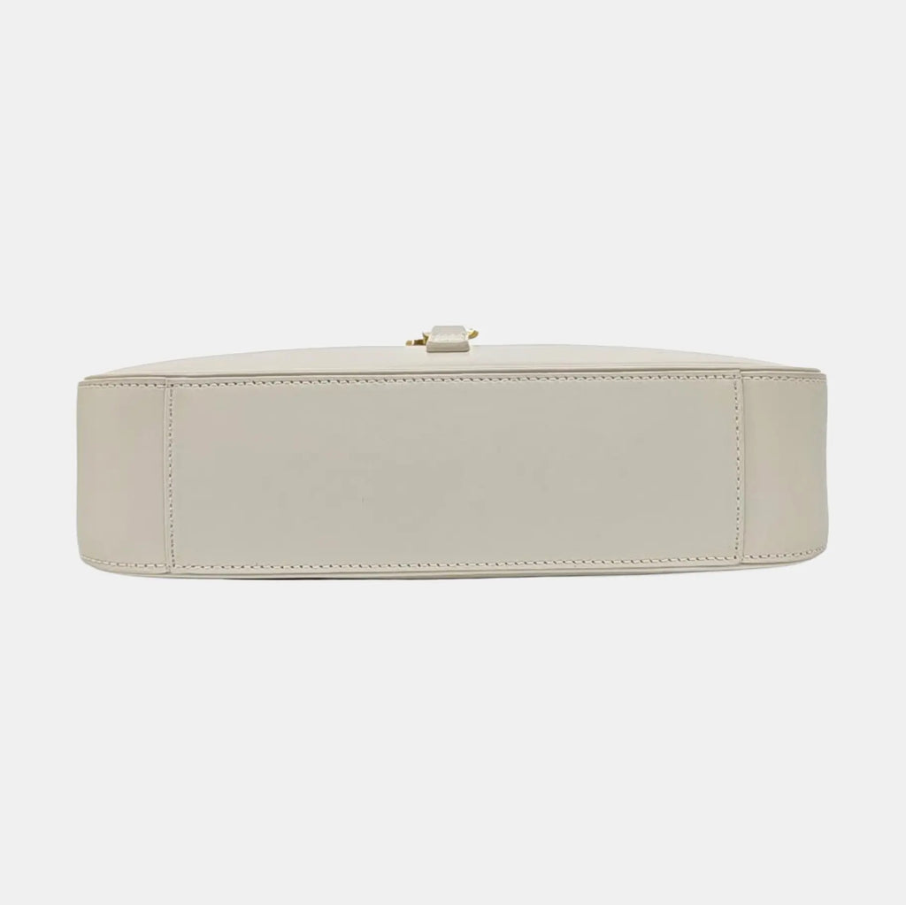 bottom view of the second hand saint laurent shoulder bag in size small in white leather excellent condition 