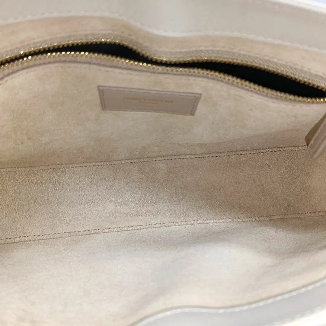 the inside of ysl saint laurent shoulder bag, clean interior no marks or stains 