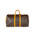 Louis Vuitton monogram canvas duffel bag with tan leather handles and side straps, shown against a plain white background.