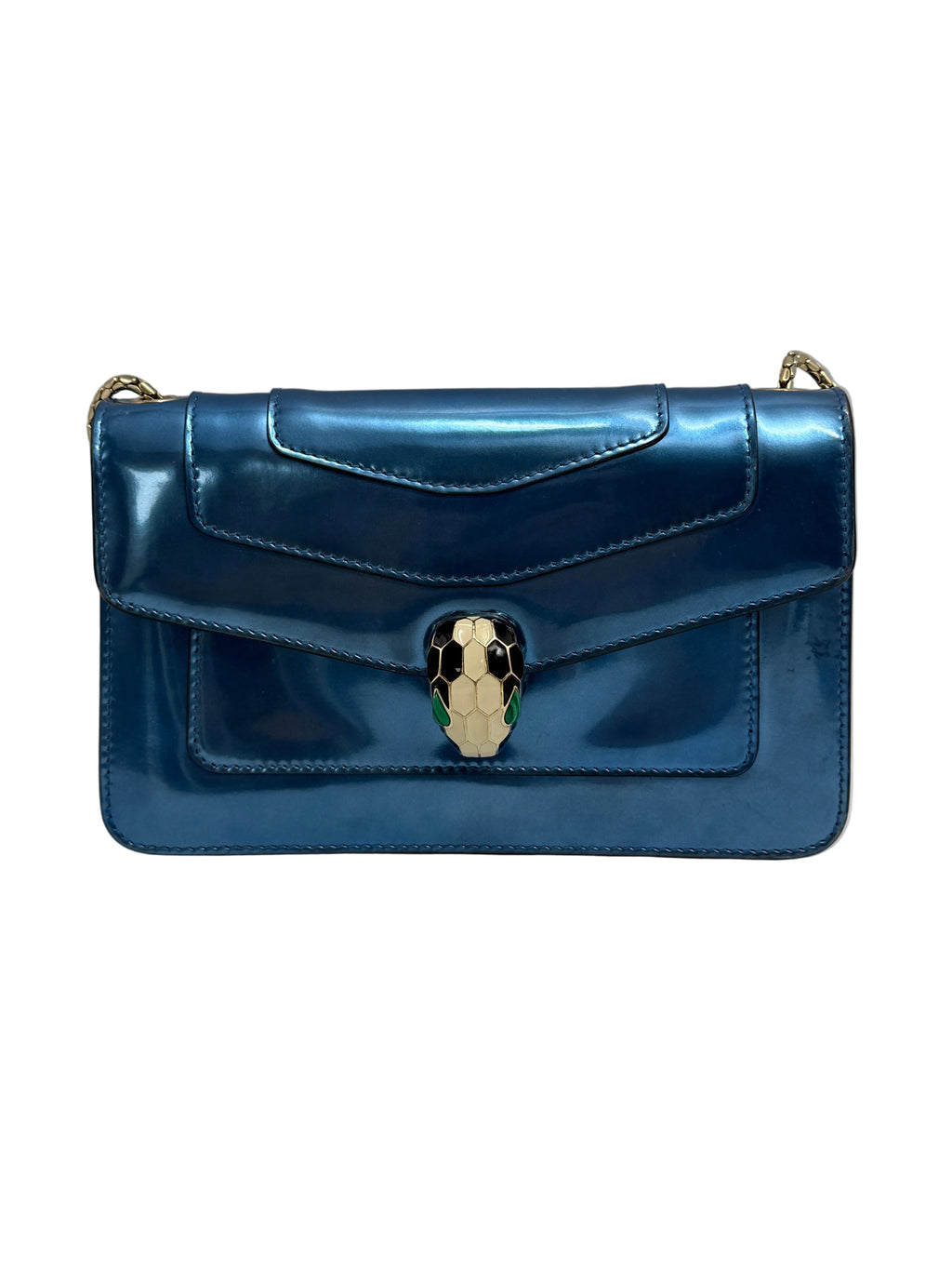 Front view of a Bvlgari Serpenti Forever shoulder bag in metallic electric blue leather with enamelled snake head closure.