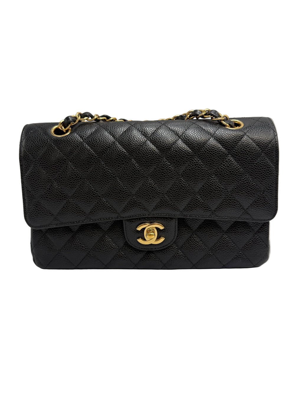 A black quilted flap shoulder bag with gold-tone hardware, featuring a prominent interlocking CC turn-lock and a chain strap, photographed against a neutral light gray background.