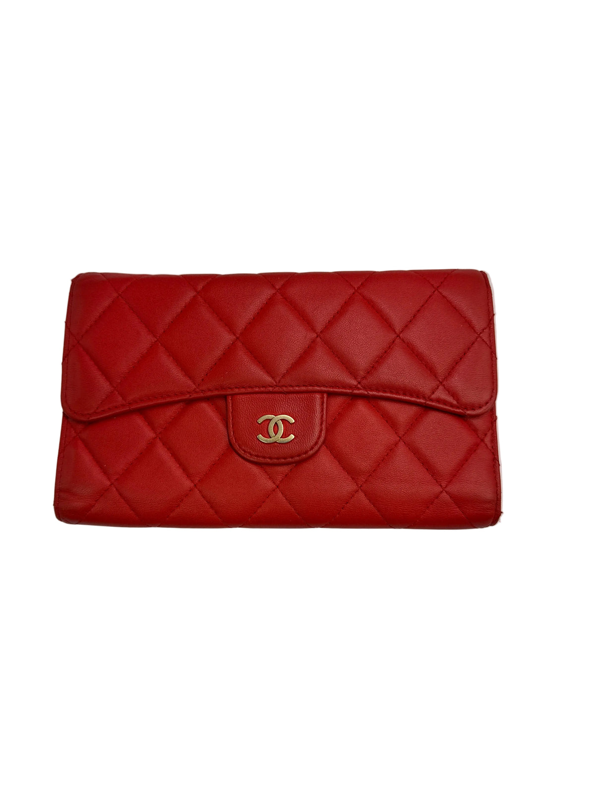 Front view of a Chanel Classic Flap continental long wallet in red diamond-quilted lambskin leather with gold-tone CC logo.
