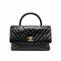 authentic preloved chanel top handle cocohandle in black leather with gold hardware in good condition for sale 