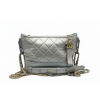 authentic preloved chanel silver leather in size small crossbody handbag cc logo gold hardware 