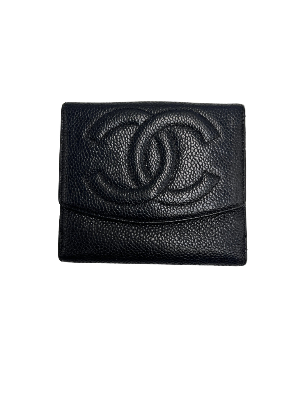 Front view of a vintage Chanel Timeless CC compact French purse wallet in black Caviar leather with stitched interlocking CC logo.