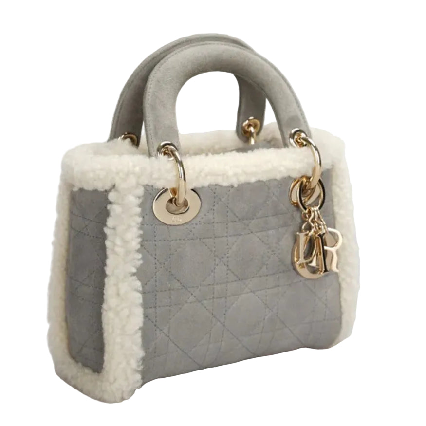 Gray lady christian dior luxury designer handbag with white fur trim and gold hardware in great condition 