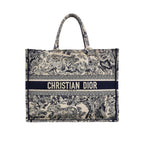 secondhand authentic women's Designer handbag with intricate pattern and Christian Dior branding in great condition for sale 