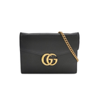preloved Black handbag with gold chain with black leather and gucci GG logo in great condition front view