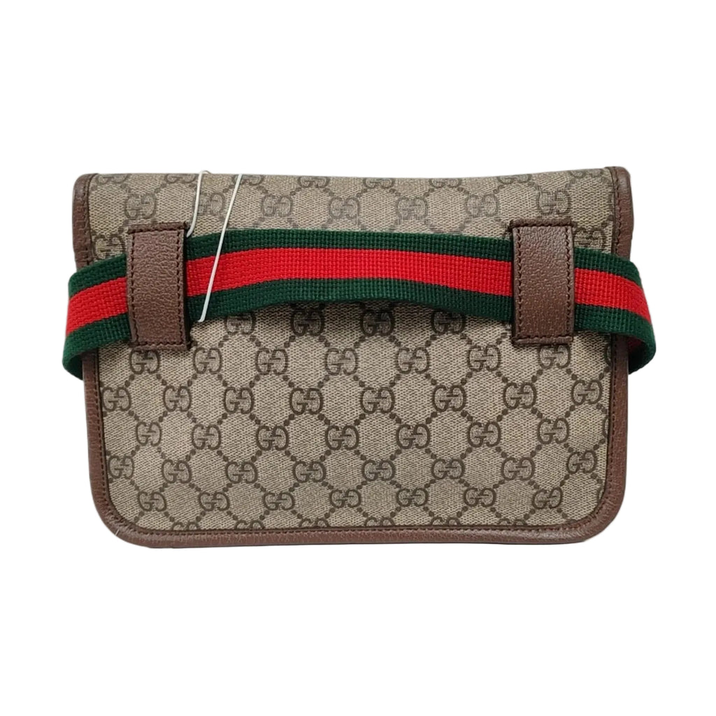 the back view of gucci gg canvas supreme in brown and classic gucci green and red strap 
