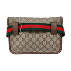 the back view of gucci gg canvas supreme in brown and classic gucci green and red strap 