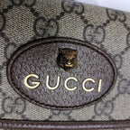 preloved gucci gg canvas supreme crossbody bag with tiger head and logo in gold in pristine condition 