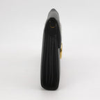 side view of gucci interlock small bag in black leather and good condition