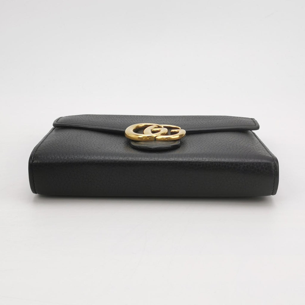 gucci black interlock g wallet on chain in size small with gold hardware and chain strap bottom view