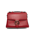 Front view of a Gucci Interlocking G top handle shoulder bag in pink pebbled leather with gold hardware.