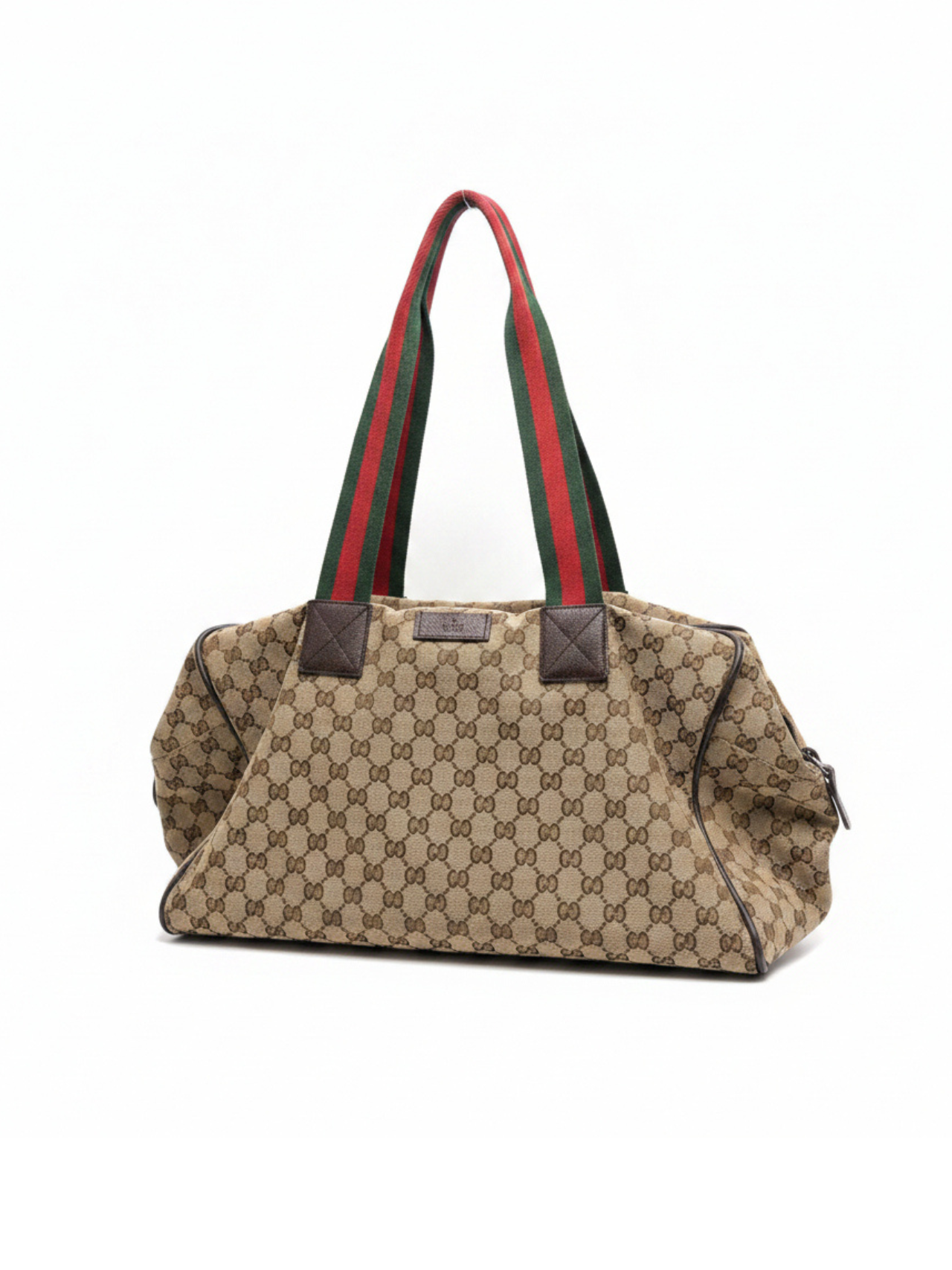 Front view of a Gucci Princy shoulder bag in GG canvas with green and red Web textile handles and brown leather trim.