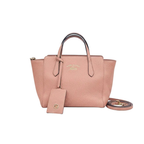 Pink handbag with a strap from gucci swing collection for sale at discount price preloved designer bag