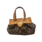 Front view of a vintage Louis Vuitton Boetie MM handbag in pleated Monogram canvas with honey vachetta leather trim and gold-tone turnlock.