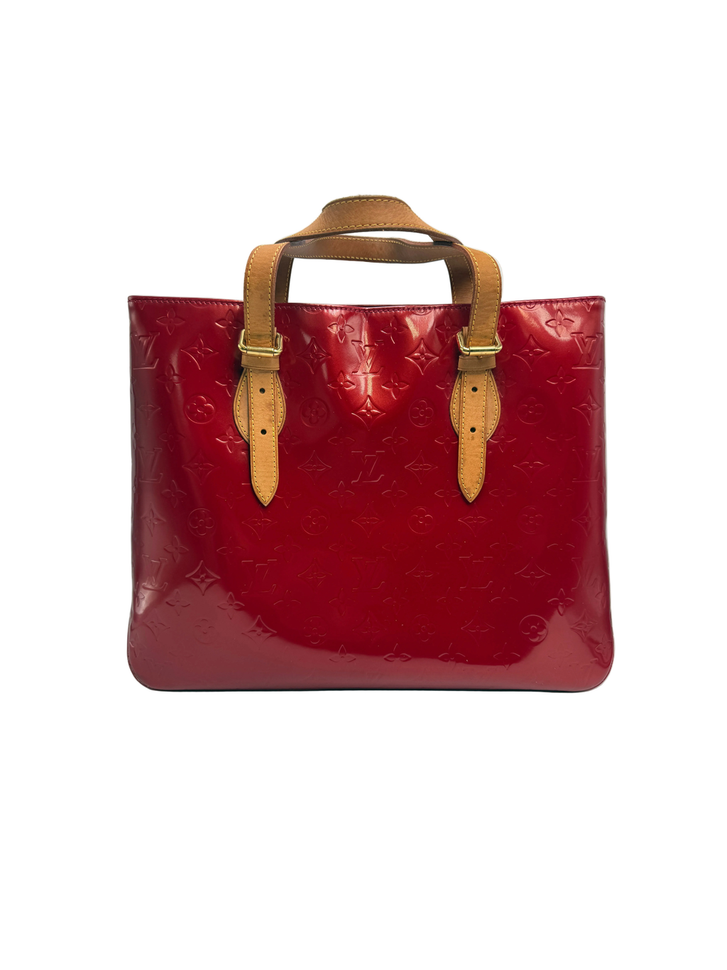 Front view of a Louis Vuitton Columbus tote bag in Rouge Fauviste Monogram Vernis patent leather with tan vachetta leather handles.