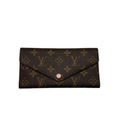 Authentic Louis Vuitton Zippy Wallet in brown Damier Ebene coated canvas with a gold-tone wrap-around zipper