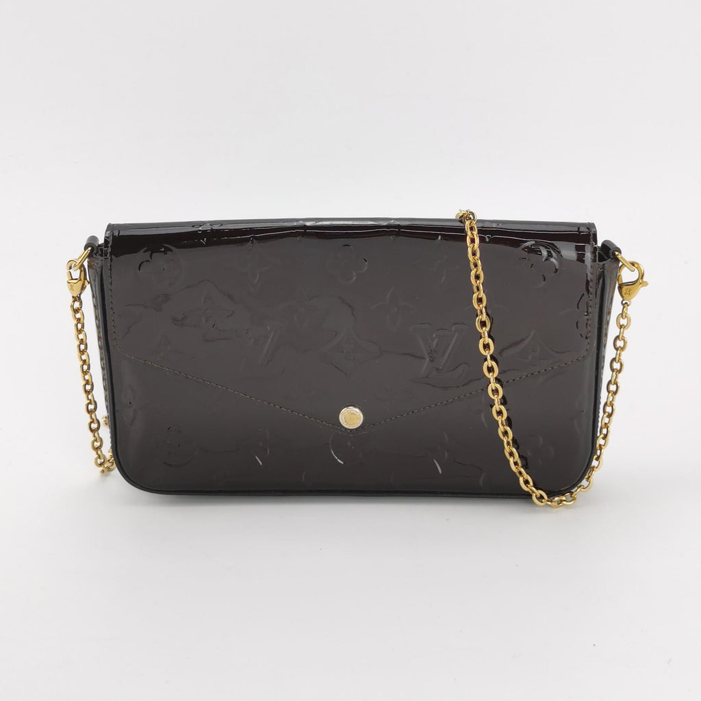 second hand black patent leather of louisv vuitton felicie pochette with strap front view 