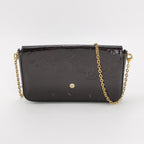 second hand black patent leather of louisv vuitton felicie pochette with strap front view 