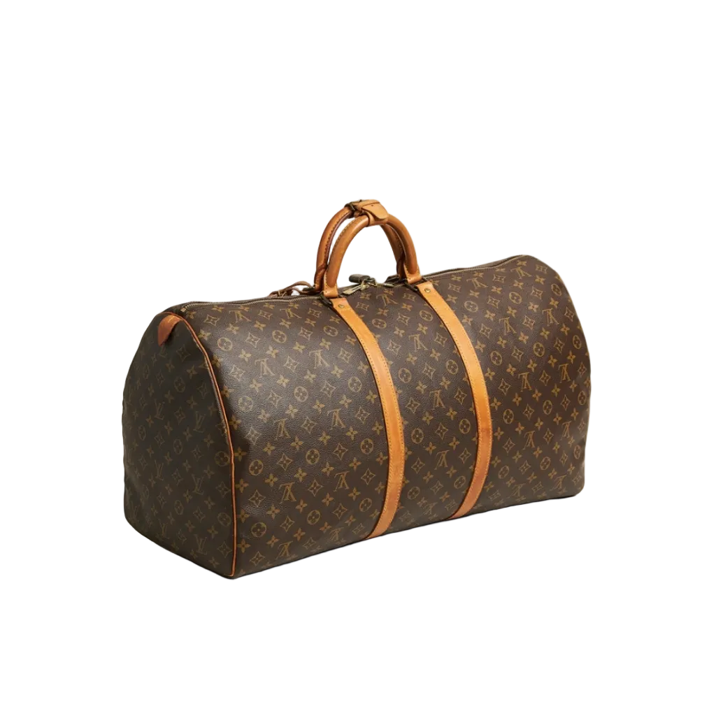 A Louis Vuitton monogram canvas duffel bag with tan leather handles and trim, photographed on a light gray studio background.