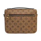 the back view of louis vuitton metis pochette reverse monogram in great condition and zipper 