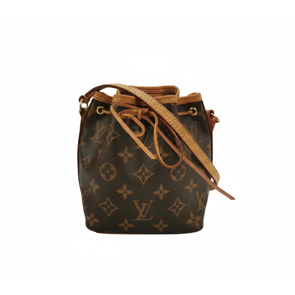 preloved luxury designer louis vuitton crossbody bucket handbag in classic brown monogram and patina vachetta lether in excellent condition 