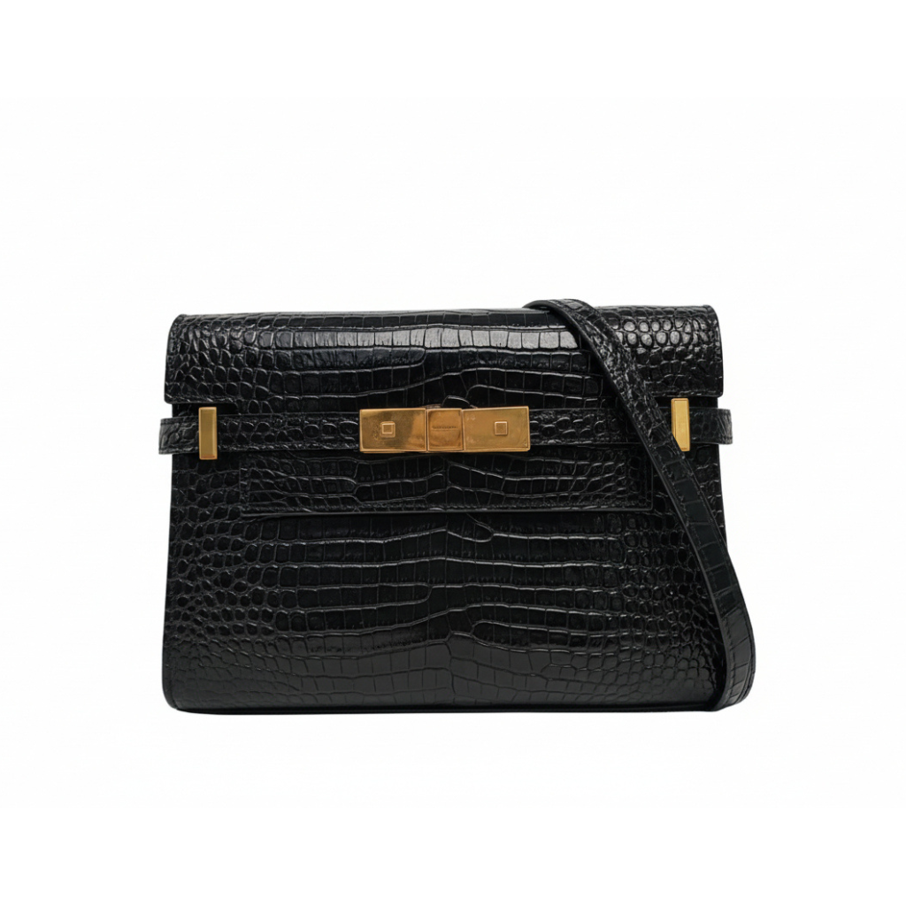 preowned authentic ysl Black crocodile-patterned handbag with gold hardware with crossbody strap in very good condition for sale